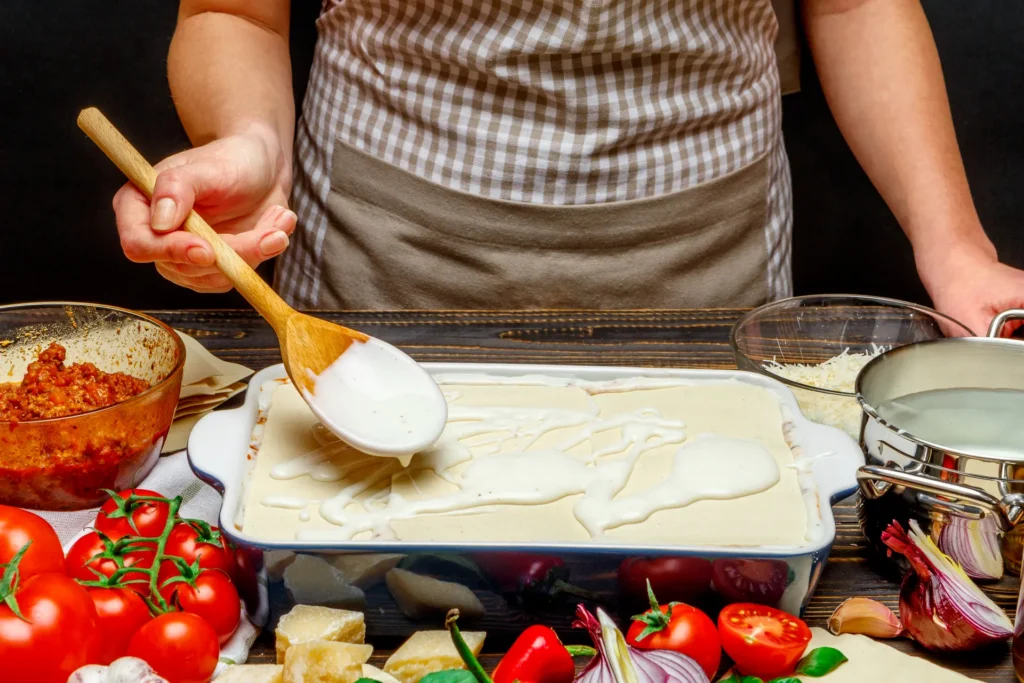 margherita-cooking-class-temp-1 Preparazione di una teglia di "pasta al forno" durante la Nonna Margherita Cooking Class